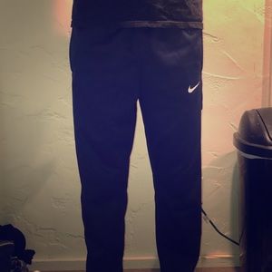 Navy blue nike warm up pants